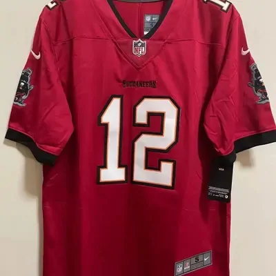 A red American football jersey with a white number 12 on the chest