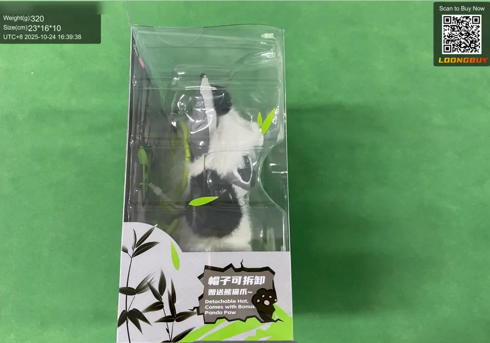 A sealed plush toy photographed front on in its retail packaging on the inspection bench