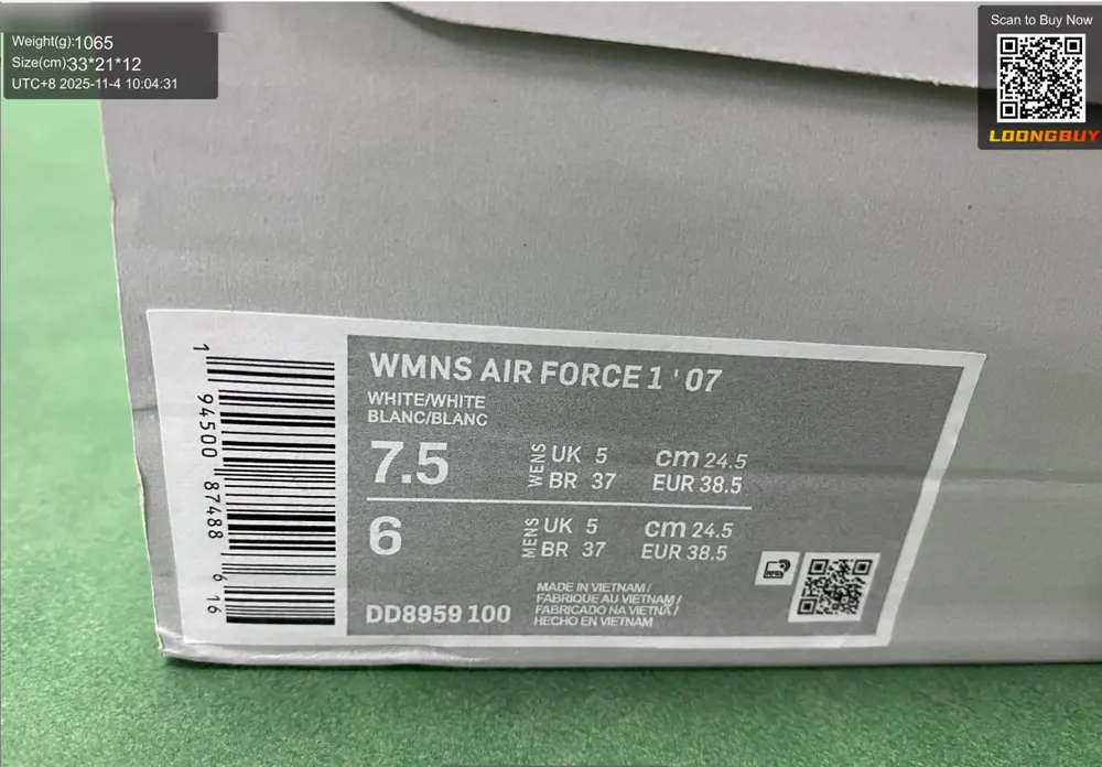 A shoe box label on the inspection bench showing UK, EUR and centimetre sizes and an article number